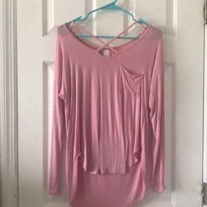 Pink Shirt, soft material. Cross in the front.